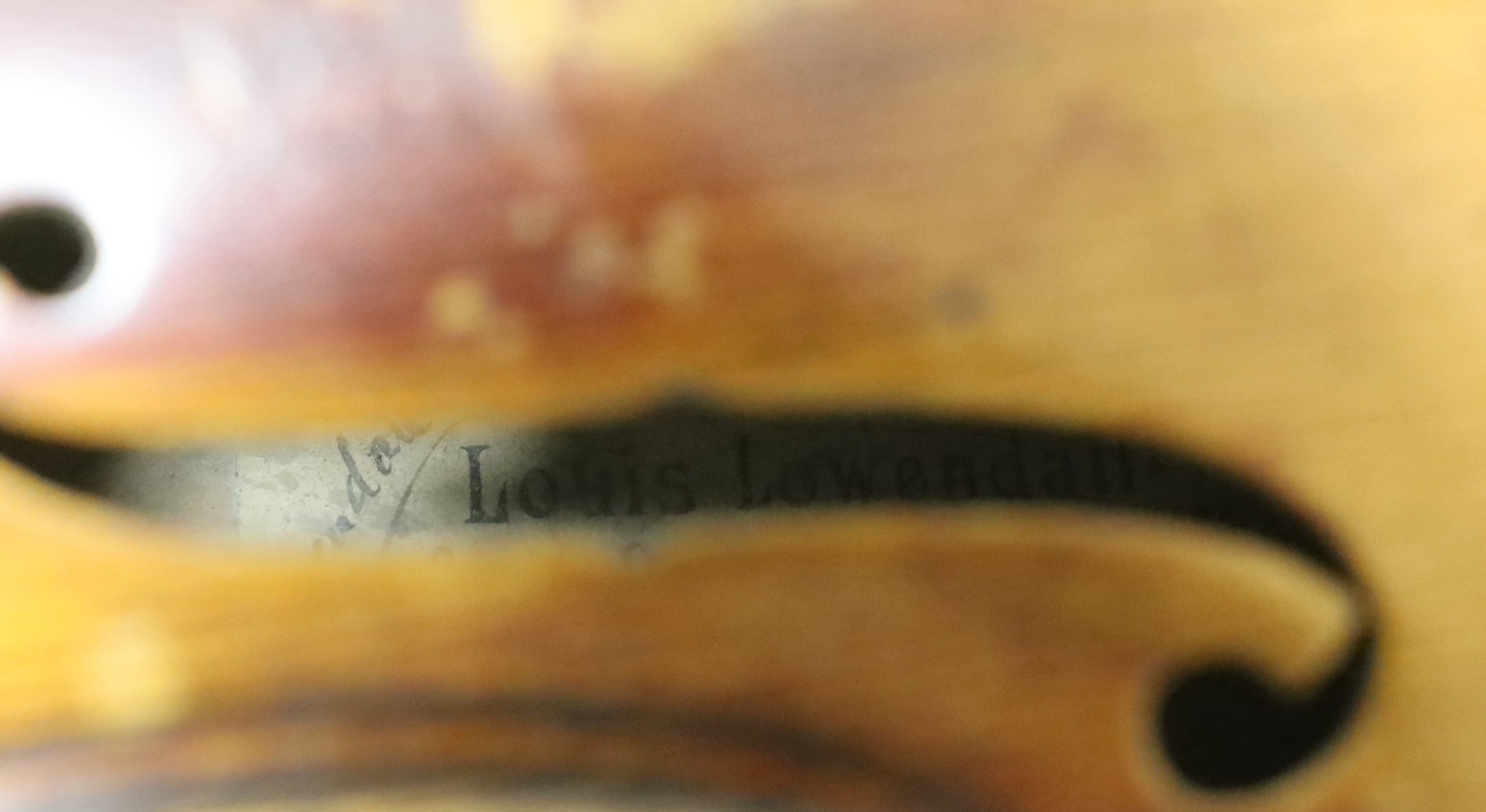 A Louis Lowendall Maggini violin, label inscribed and dated 1885, cased